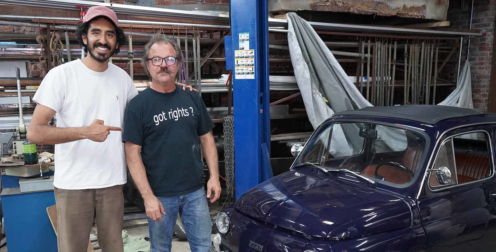 Dev Patel in Watts, CA with his Fiat electric car.